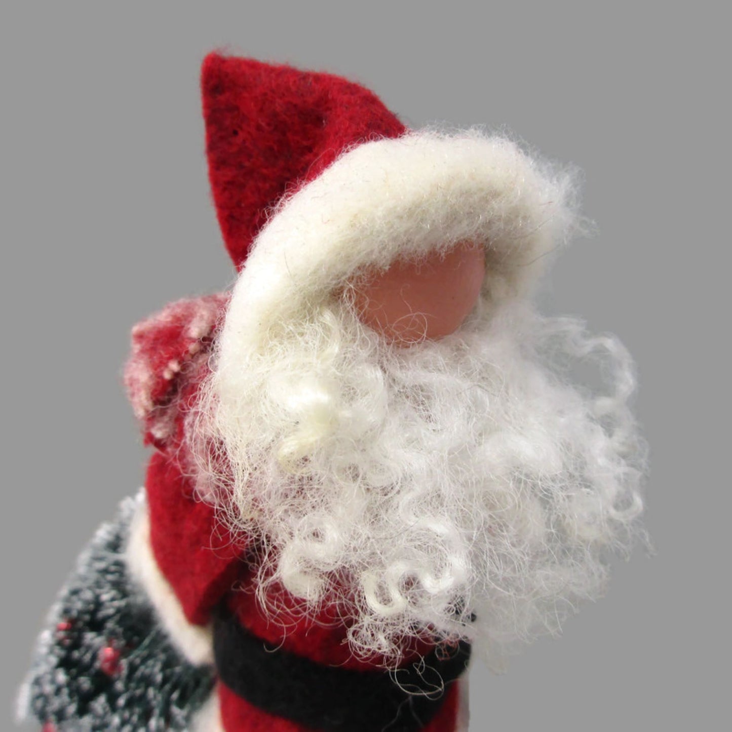 Santa Dragging a Christmas Tree