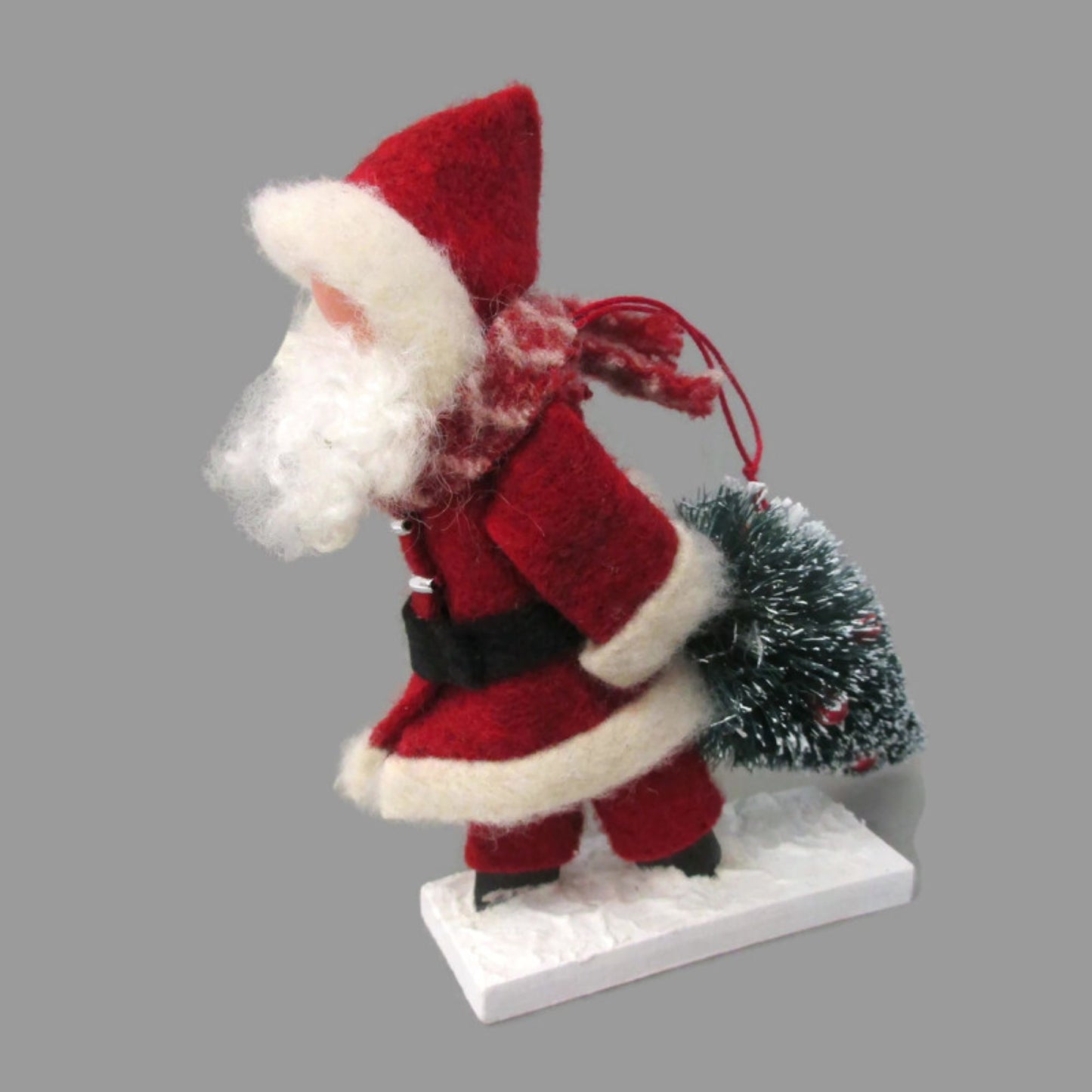 Santa Dragging a Christmas Tree