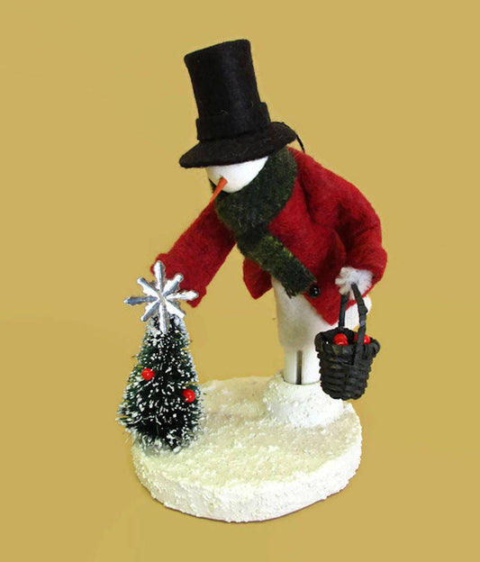 Snowman Decorating the Tree