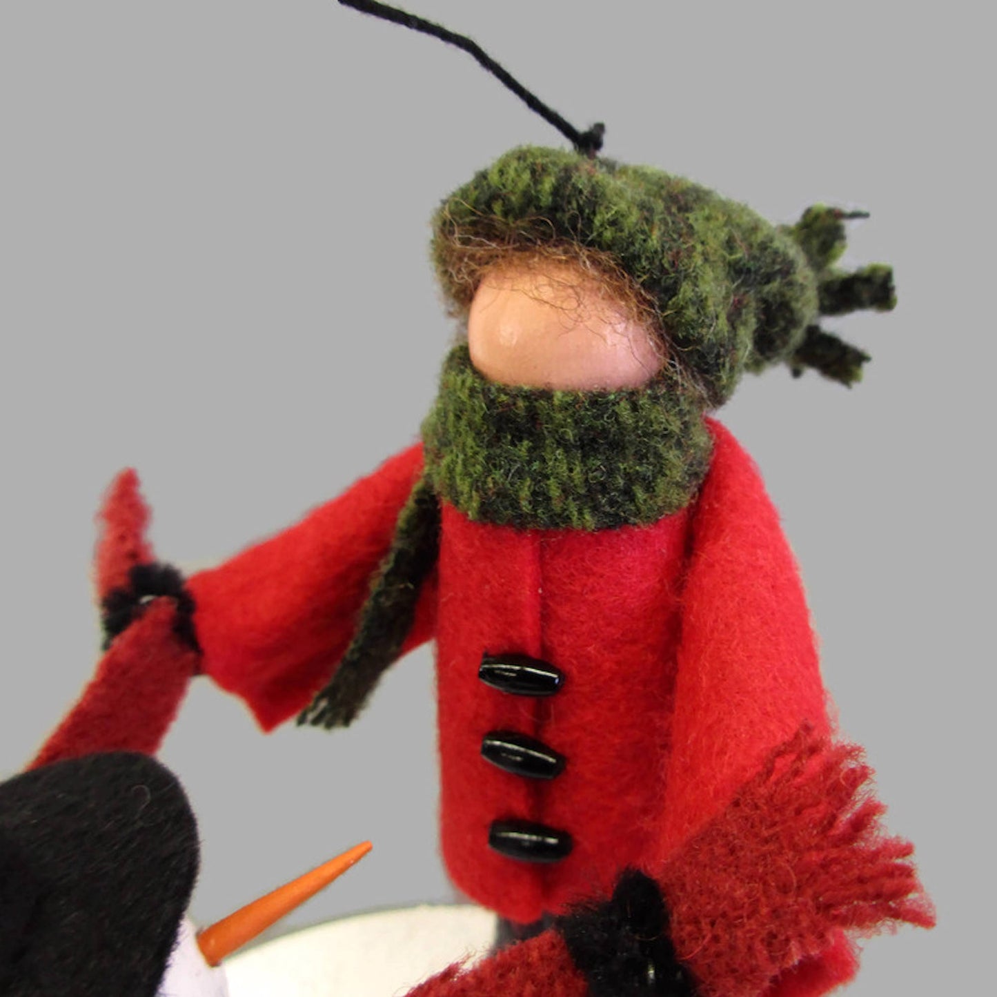 Boy Making A Snowman