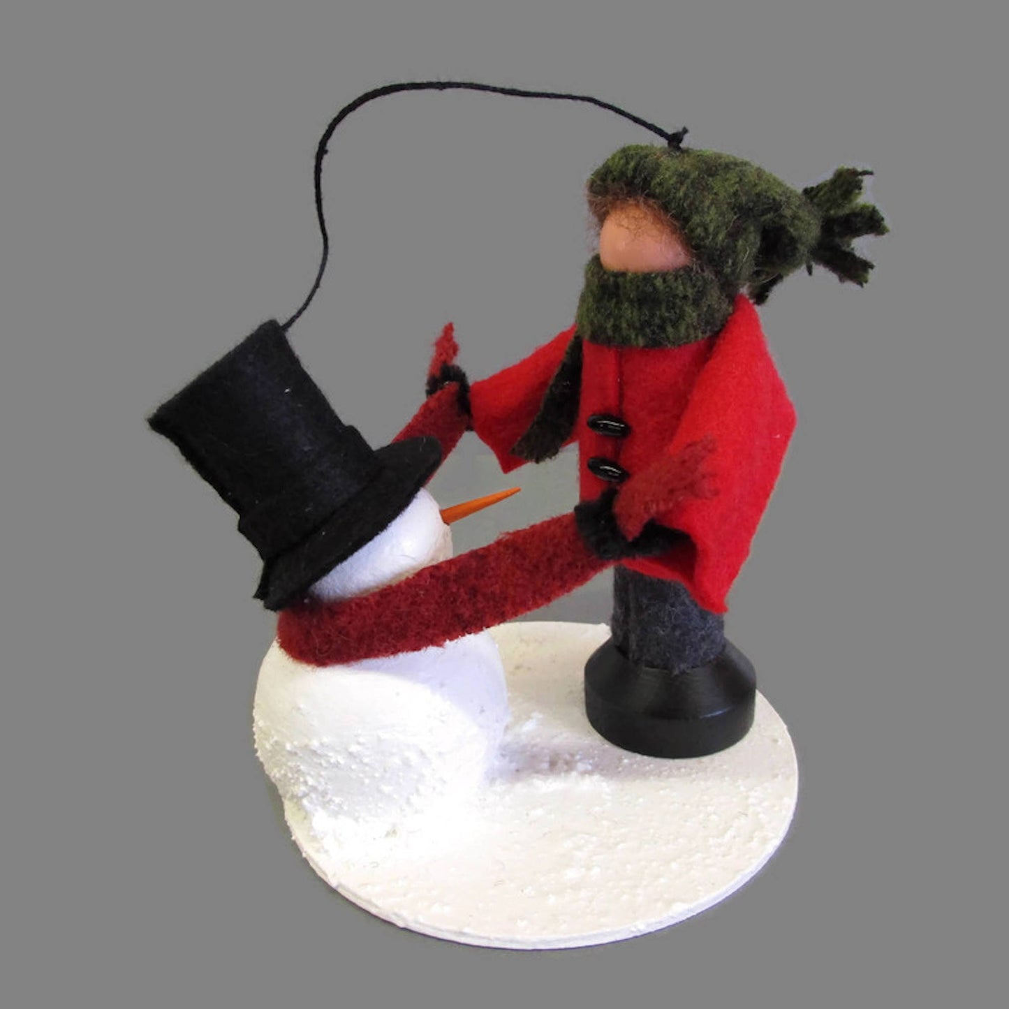 Boy Making A Snowman