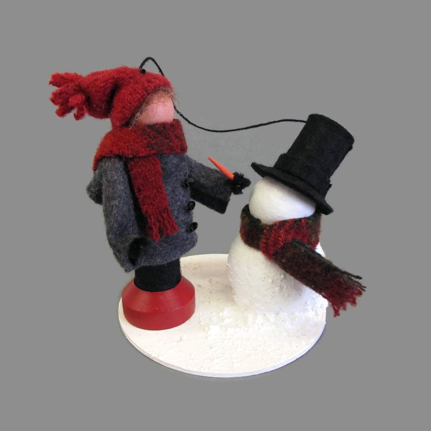 Boy Making A Snowman