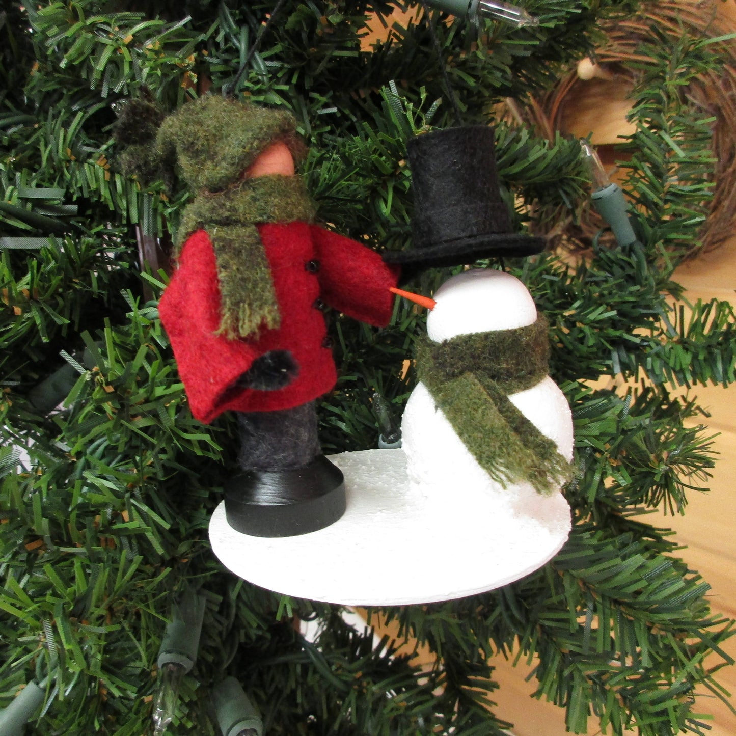 Boy Making A Snowman