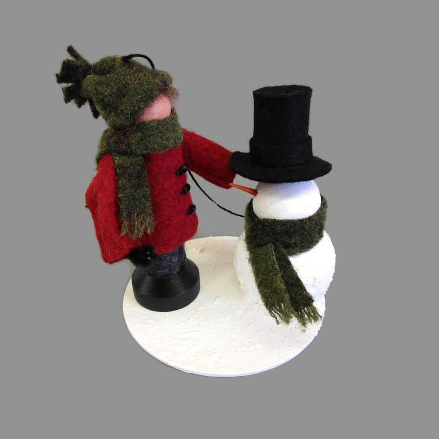 Boy Making A Snowman